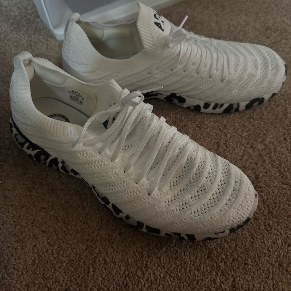 Sleek White and Black Patterned Athletic Shoes